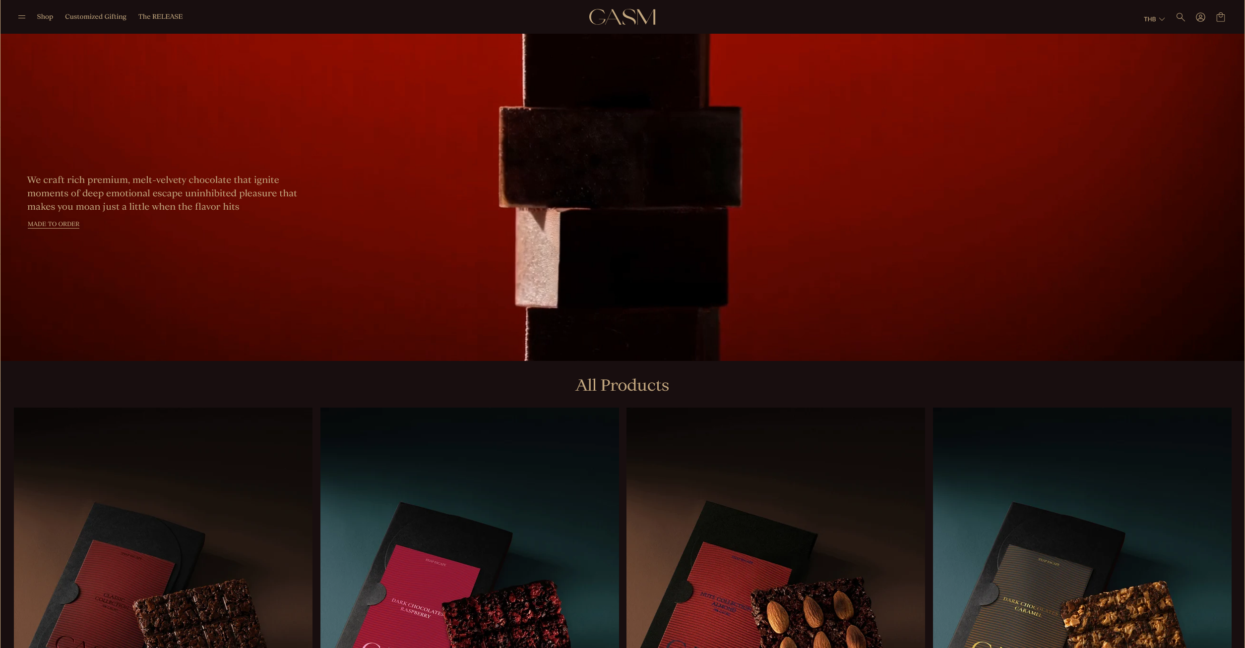 The GASM shop home page: a deep red hero with a stack of chocolate blocks, above a row of product cards under the heading All Products.